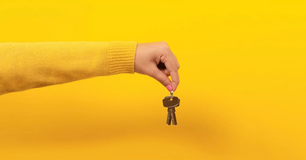 Photograph of a hand holding a set of keys